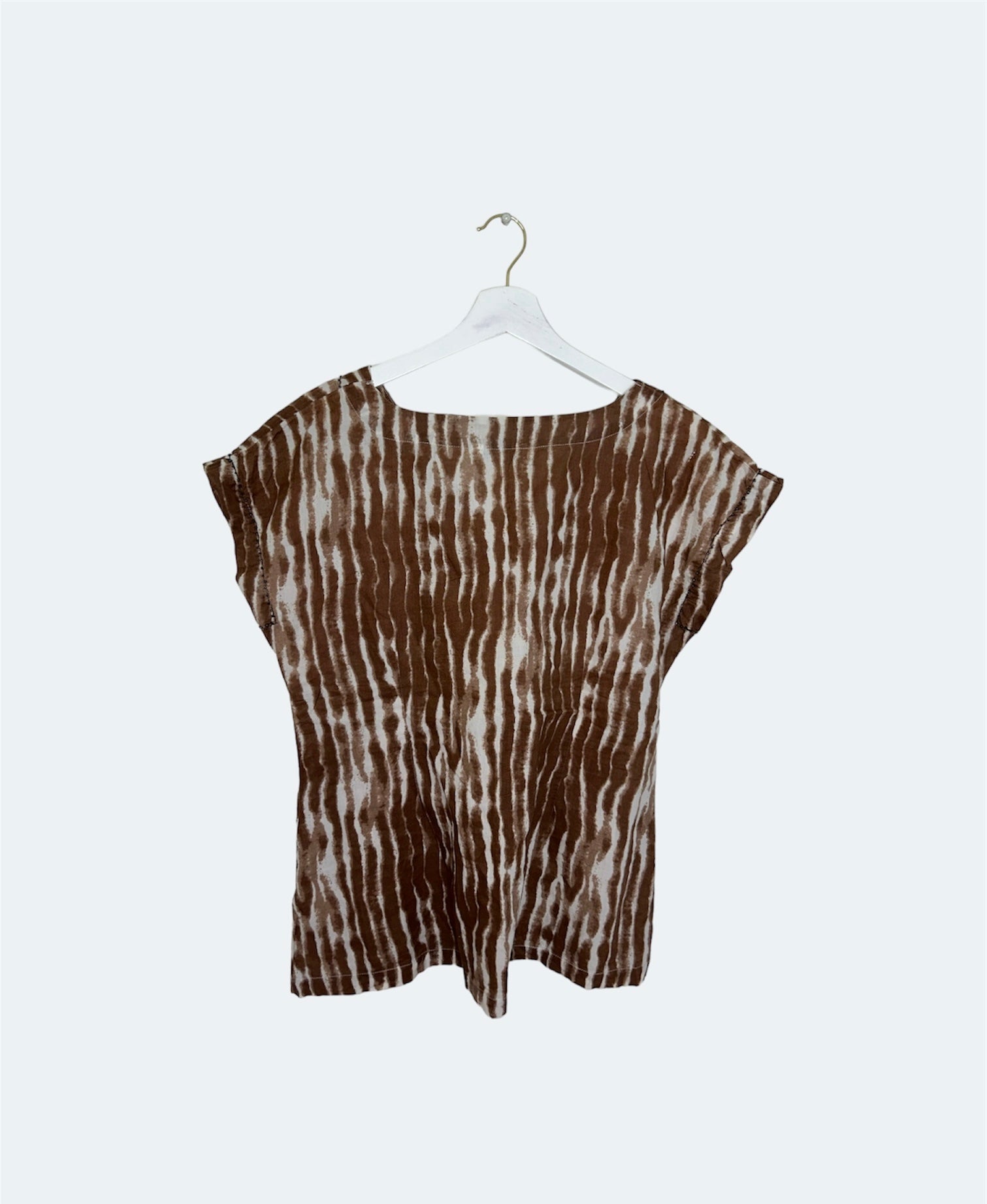back of brown and white vintage top
