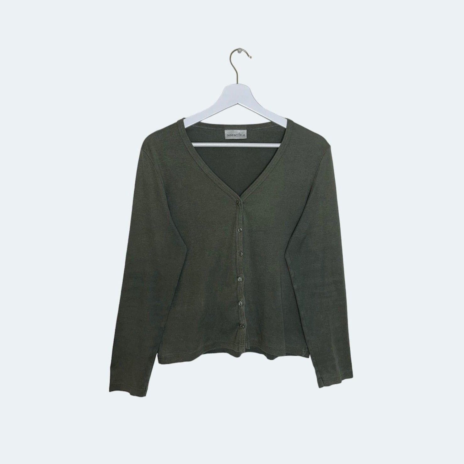 green button up long sleeve top shown on a white background
