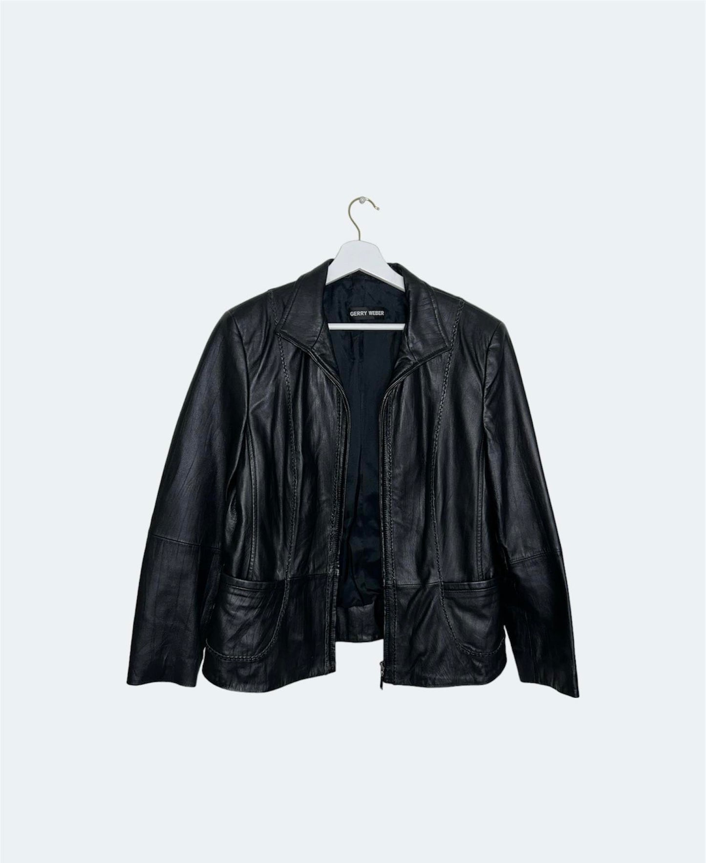 front of black leather vintage bomber jacket