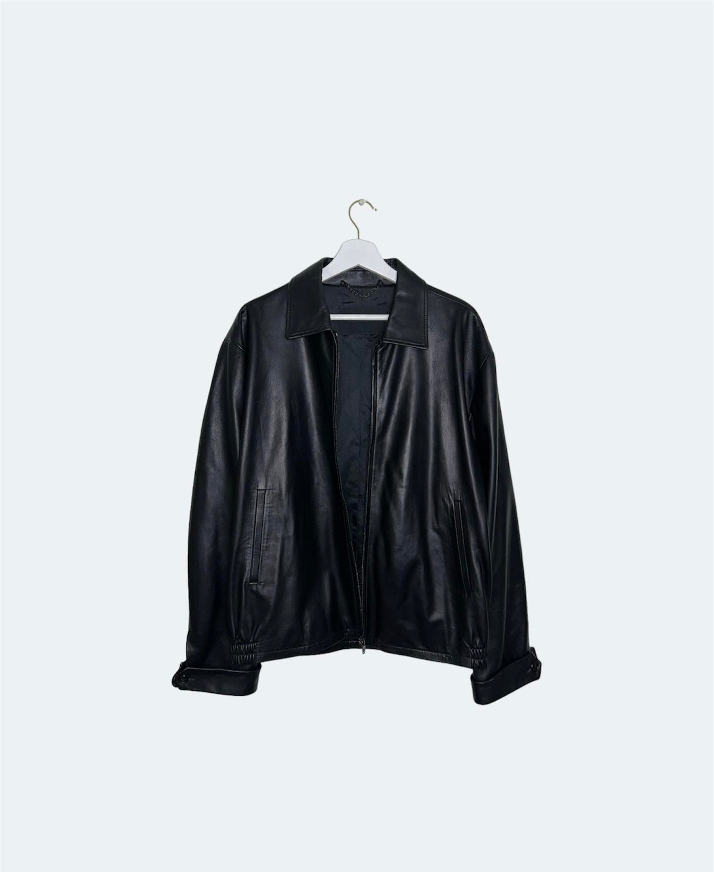 front of vintage oversized black leather bomber jacket