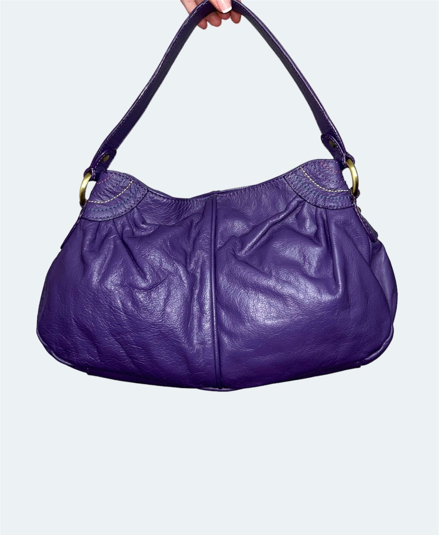 back of purple vintage leather shoulder bag