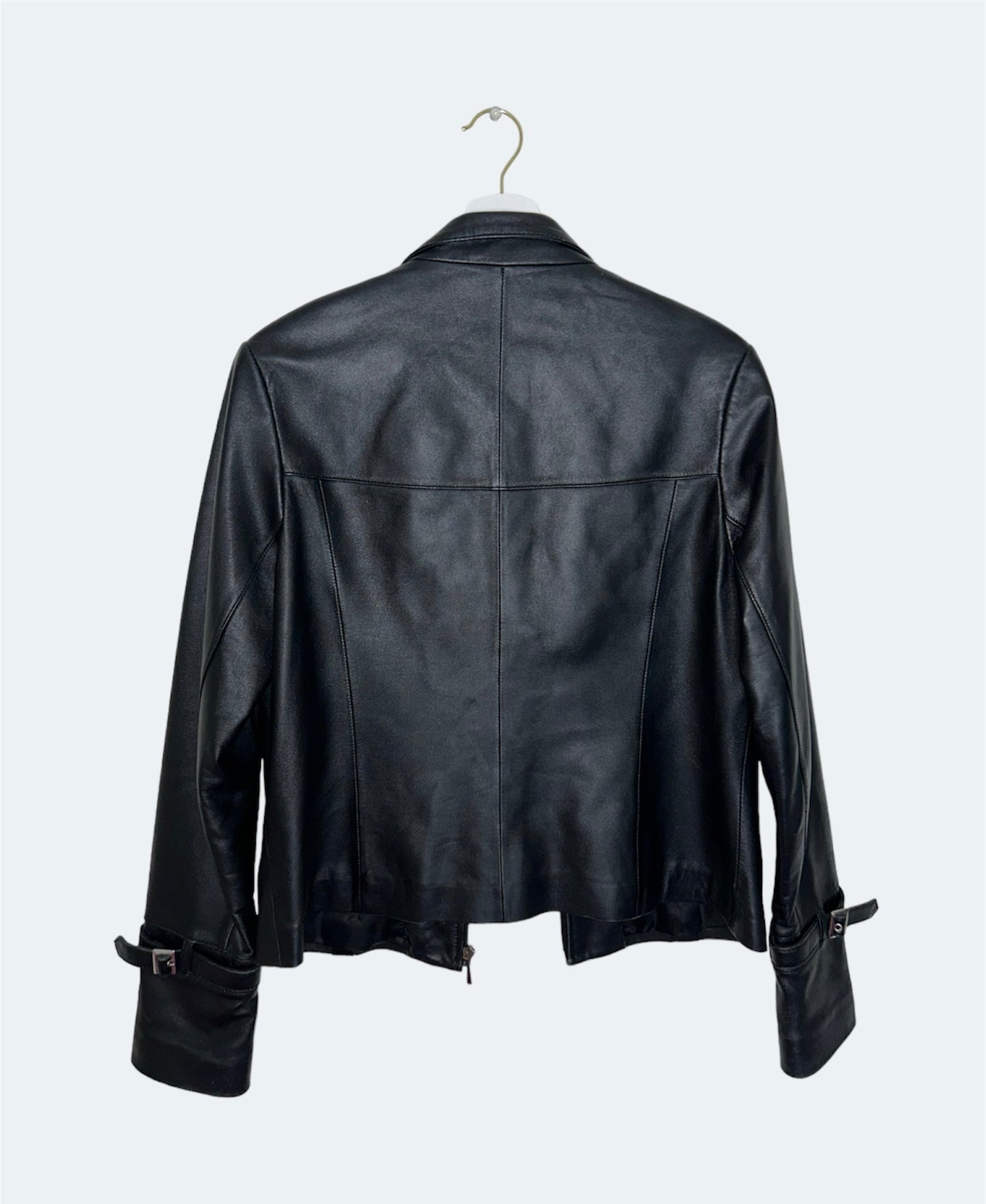 back of black leather buckle bomber jacket