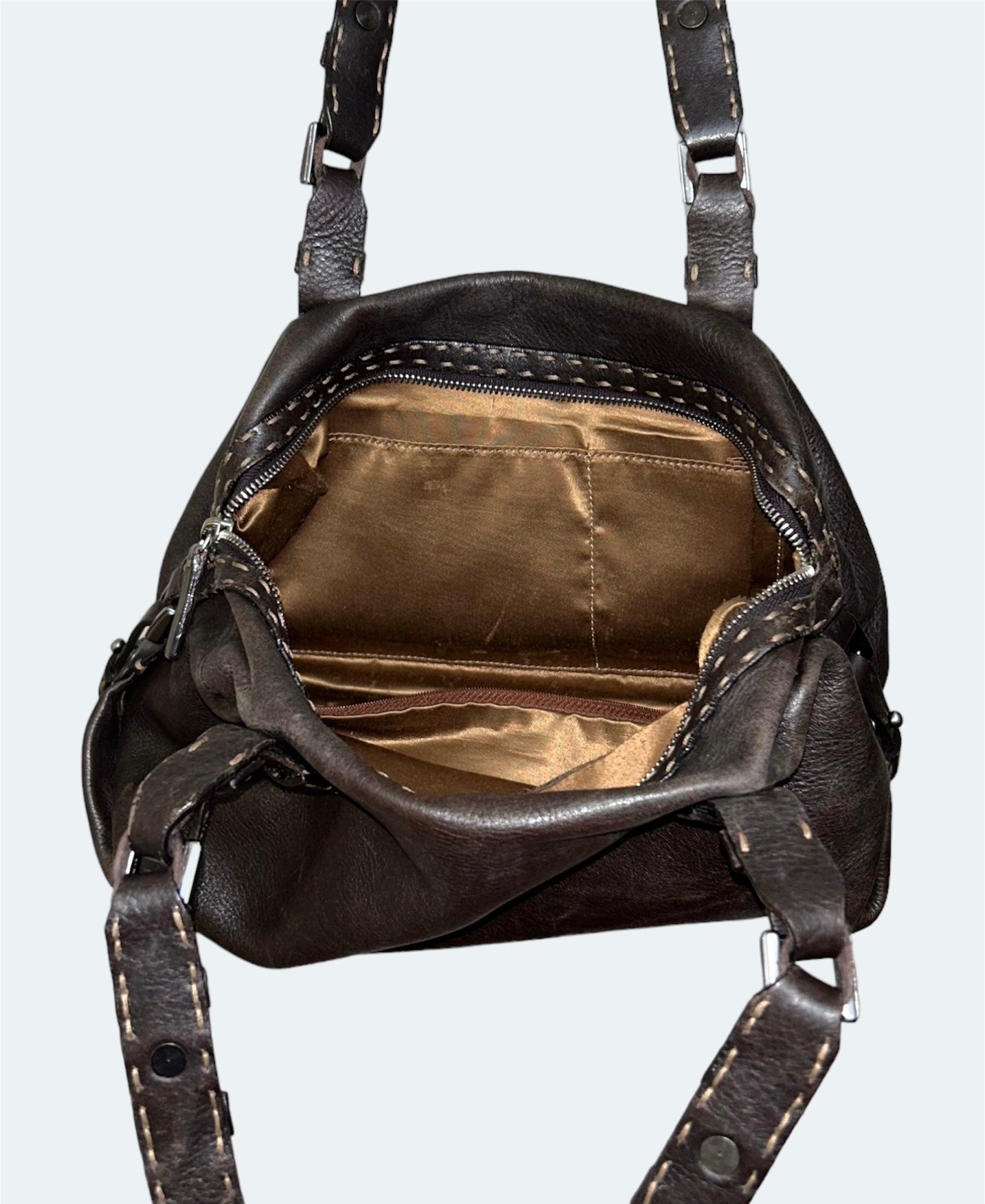 inside of brown leather shoulder bag 