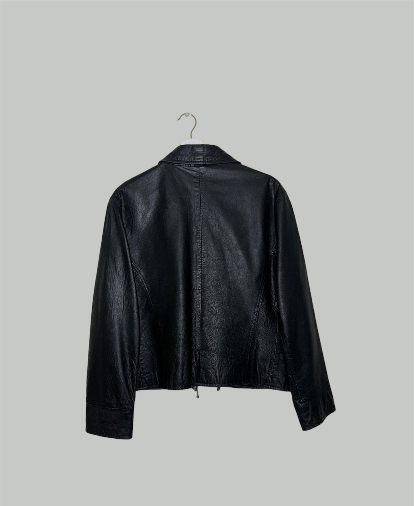 back of black leather zip up jacket