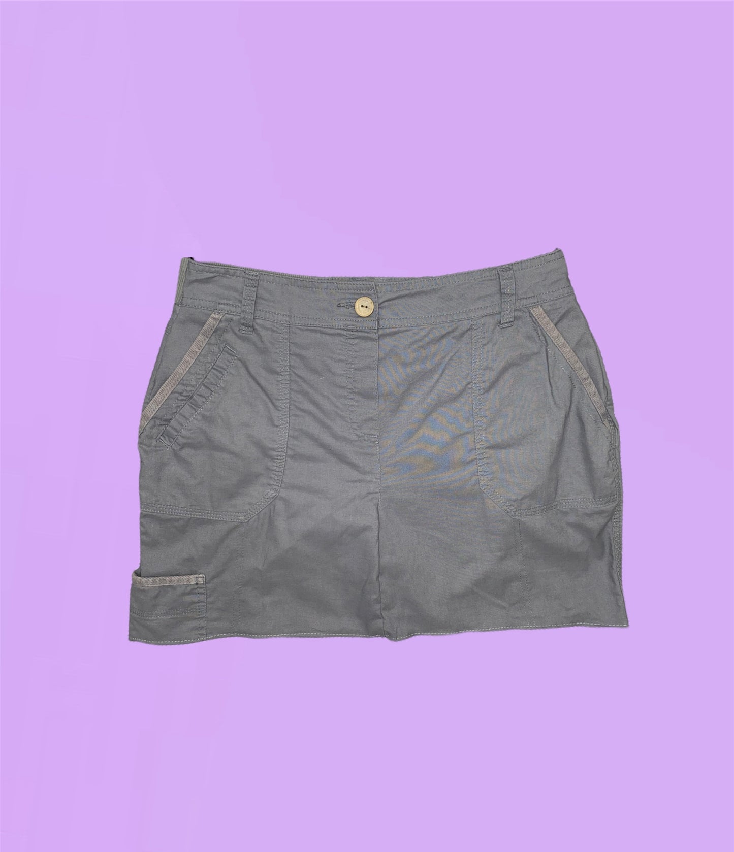 grey mini cargo skirt on a lilac background