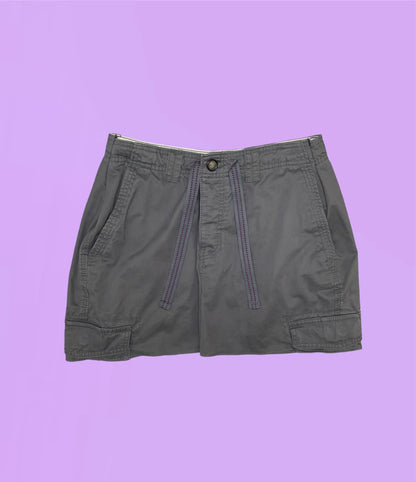 grey mini cargo skirt on a lilac background